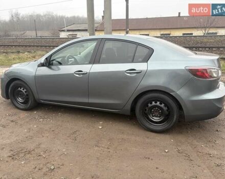 Серый Мазда 3, объемом двигателя 2 л и пробегом 212 тыс. км за 7500 $, фото 4 на Automoto.ua