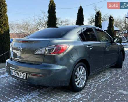 Сірий Мазда 3, об'ємом двигуна 2 л та пробігом 214 тис. км за 7250 $, фото 3 на Automoto.ua