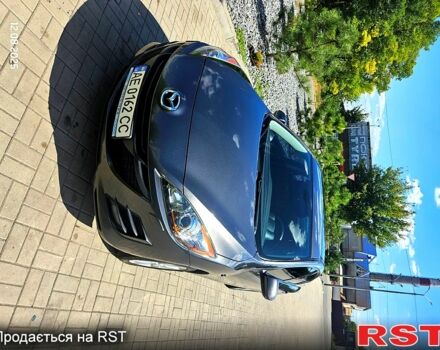 Серый Мазда 3, объемом двигателя 1.6 л и пробегом 118 тыс. км за 9900 $, фото 1 на Automoto.ua