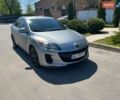Серый Мазда 3, объемом двигателя 2 л и пробегом 208 тыс. км за 7700 $, фото 1 на Automoto.ua