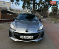 Серый Мазда 3, объемом двигателя 1.6 л и пробегом 259 тыс. км за 8500 $, фото 1 на Automoto.ua