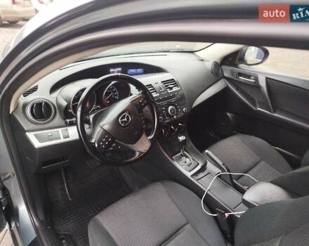 Серый Мазда 3, объемом двигателя 2 л и пробегом 232 тыс. км за 7799 $, фото 21 на Automoto.ua