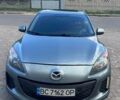 Сірий Мазда 3, об'ємом двигуна 2 л та пробігом 220 тис. км за 7250 $, фото 1 на Automoto.ua