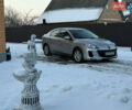 Серый Мазда 3, объемом двигателя 2 л и пробегом 192 тыс. км за 6700 $, фото 1 на Automoto.ua