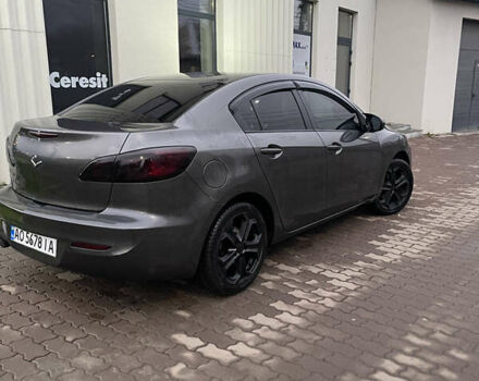 Серый Мазда 3, объемом двигателя 2 л и пробегом 250 тыс. км за 6400 $, фото 3 на Automoto.ua