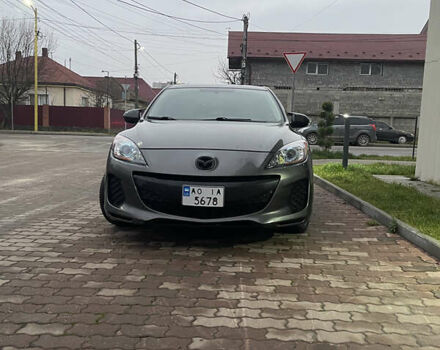 Серый Мазда 3, объемом двигателя 2 л и пробегом 250 тыс. км за 6400 $, фото 1 на Automoto.ua