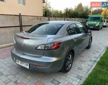 Сірий Мазда 3, об'ємом двигуна 2 л та пробігом 130 тис. км за 7350 $, фото 2 на Automoto.ua
