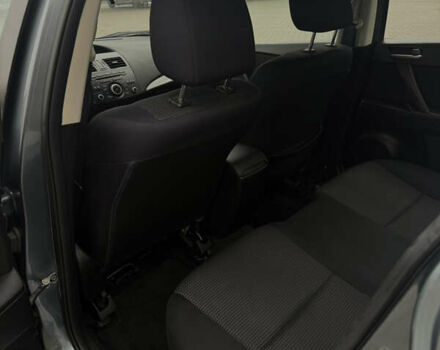 Серый Мазда 3, объемом двигателя 2 л и пробегом 201 тыс. км за 7000 $, фото 27 на Automoto.ua