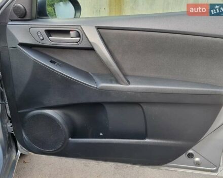 Серый Мазда 3, объемом двигателя 2 л и пробегом 190 тыс. км за 6999 $, фото 46 на Automoto.ua