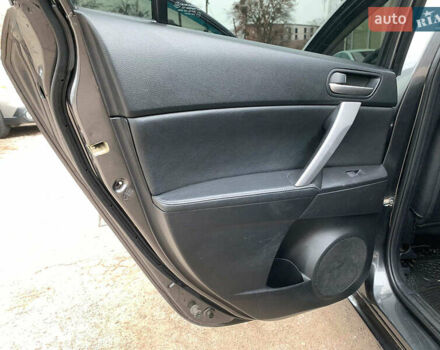 Серый Мазда 3, объемом двигателя 2 л и пробегом 254 тыс. км за 7990 $, фото 18 на Automoto.ua