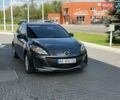 Серый Мазда 3, объемом двигателя 2 л и пробегом 203 тыс. км за 7500 $, фото 1 на Automoto.ua