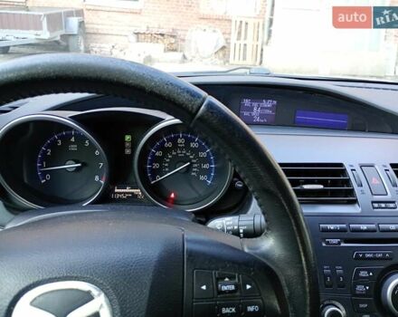 Серый Мазда 3, объемом двигателя 2 л и пробегом 181 тыс. км за 7700 $, фото 12 на Automoto.ua