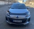 Сірий Мазда 3, об'ємом двигуна 2 л та пробігом 285 тис. км за 8800 $, фото 1 на Automoto.ua
