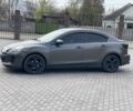 Серый Мазда 3, объемом двигателя 2 л и пробегом 210 тыс. км за 7300 $, фото 1 на Automoto.ua