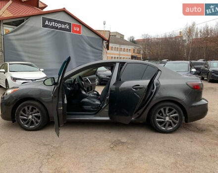 Серый Мазда 3, объемом двигателя 2 л и пробегом 254 тыс. км за 7990 $, фото 12 на Automoto.ua