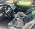 Серый Мазда 3, объемом двигателя 2 л и пробегом 290 тыс. км за 7777 $, фото 10 на Automoto.ua