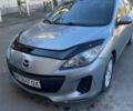 Серый Мазда 3, объемом двигателя 2 л и пробегом 285 тыс. км за 8800 $, фото 1 на Automoto.ua