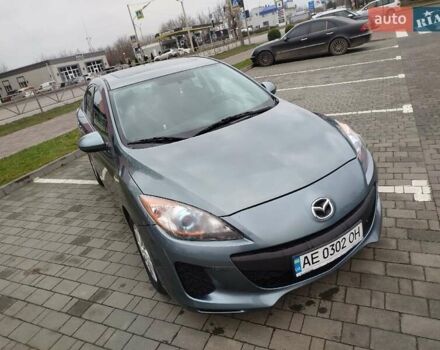 Серый Мазда 3, объемом двигателя 2 л и пробегом 232 тыс. км за 7799 $, фото 1 на Automoto.ua