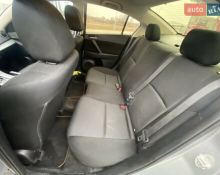 Серый Мазда 3, объемом двигателя 2 л и пробегом 200 тыс. км за 6999 $, фото 12 на Automoto.ua