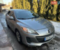 Сірий Мазда 3, об'ємом двигуна 2 л та пробігом 237 тис. км за 6999 $, фото 1 на Automoto.ua