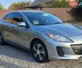 Серый Мазда 3, объемом двигателя 2 л и пробегом 225 тыс. км за 6800 $, фото 1 на Automoto.ua