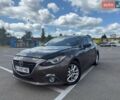 Серый Мазда 3, объемом двигателя 1.5 л и пробегом 136 тыс. км за 10999 $, фото 1 на Automoto.ua