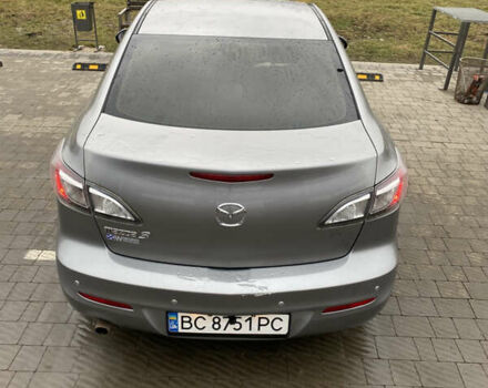 Серый Мазда 3, объемом двигателя 2 л и пробегом 200 тыс. км за 6999 $, фото 2 на Automoto.ua