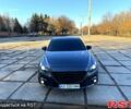 Сірий Мазда 3, об'ємом двигуна 2 л та пробігом 211 тис. км за 10300 $, фото 1 на Automoto.ua