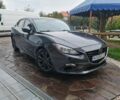 Серый Мазда 3, объемом двигателя 2 л и пробегом 202 тыс. км за 9500 $, фото 1 на Automoto.ua