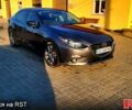 Серый Мазда 3, объемом двигателя 2 л и пробегом 128 тыс. км за 11300 $, фото 1 на Automoto.ua