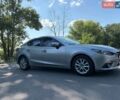 Серый Мазда 3, объемом двигателя 1.5 л и пробегом 95 тыс. км за 14000 $, фото 1 на Automoto.ua