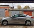 Серый Мазда 3, объемом двигателя 2 л и пробегом 186 тыс. км за 13000 $, фото 1 на Automoto.ua