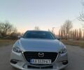 Серый Мазда 3, объемом двигателя 2 л и пробегом 211 тыс. км за 11000 $, фото 1 на Automoto.ua