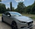 Серый Мазда 3, объемом двигателя 2 л и пробегом 199 тыс. км за 10200 $, фото 1 на Automoto.ua