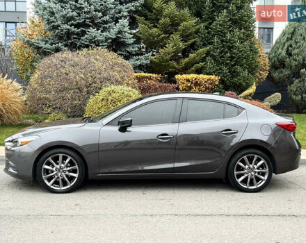 Серый Мазда 3, объемом двигателя 2.49 л и пробегом 58 тыс. км за 14500 $, фото 2 на Automoto.ua