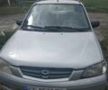 Серый Мазда 3, объемом двигателя 1.3 л и пробегом 2 тыс. км за 2100 $, фото 1 на Automoto.ua