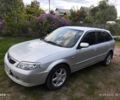 Серый Мазда 3, объемом двигателя 1.6 л и пробегом 305 тыс. км за 2000 $, фото 1 на Automoto.ua