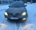 Серый Мазда 3, объемом двигателя 1.6 л и пробегом 258 тыс. км за 4200 $, фото 1 на Automoto.ua