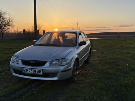 Сірий Мазда 3, об'ємом двигуна 2 л та пробігом 250 тис. км за 600 $, фото 1 на Automoto.ua