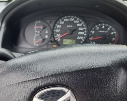 Серый Мазда 3, объемом двигателя 1.6 л и пробегом 245 тыс. км за 1450 $, фото 1 на Automoto.ua