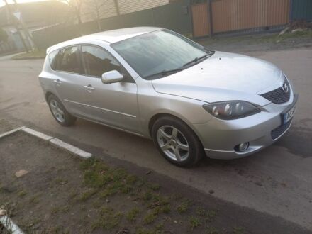 Серый Мазда 3, объемом двигателя 1.6 л и пробегом 255 тыс. км за 3200 $, фото 1 на Automoto.ua