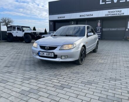 Сірий Мазда 3, об'ємом двигуна 2 л та пробігом 237 тис. км за 1000 $, фото 1 на Automoto.ua