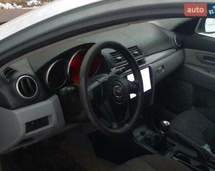 Серый Мазда 3, объемом двигателя 1.35 л и пробегом 250 тыс. км за 2450 $, фото 1 на Automoto.ua