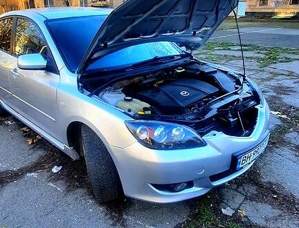 Сірий Мазда 3, об'ємом двигуна 2 л та пробігом 230 тис. км за 4700 $, фото 1 на Automoto.ua