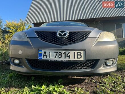 Серый Мазда 3, объемом двигателя 1.6 л и пробегом 239 тыс. км за 3999 $, фото 1 на Automoto.ua