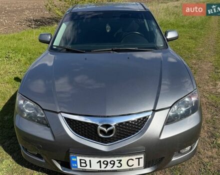Серый Мазда 3, объемом двигателя 1.6 л и пробегом 318 тыс. км за 5200 $, фото 1 на Automoto.ua
