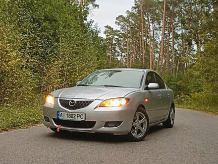 Серый Мазда 3, объемом двигателя 2 л и пробегом 345 тыс. км за 4150 $, фото 1 на Automoto.ua