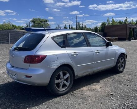 Серый Мазда 3, объемом двигателя 1.6 л и пробегом 302 тыс. км за 1999 $, фото 1 на Automoto.ua