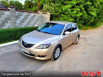 Серый Мазда 3, объемом двигателя 1.6 л и пробегом 280 тыс. км за 4400 $, фото 1 на Automoto.ua