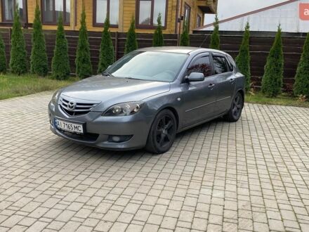 Серый Мазда 3, объемом двигателя 1.6 л и пробегом 325 тыс. км за 2999 $, фото 1 на Automoto.ua